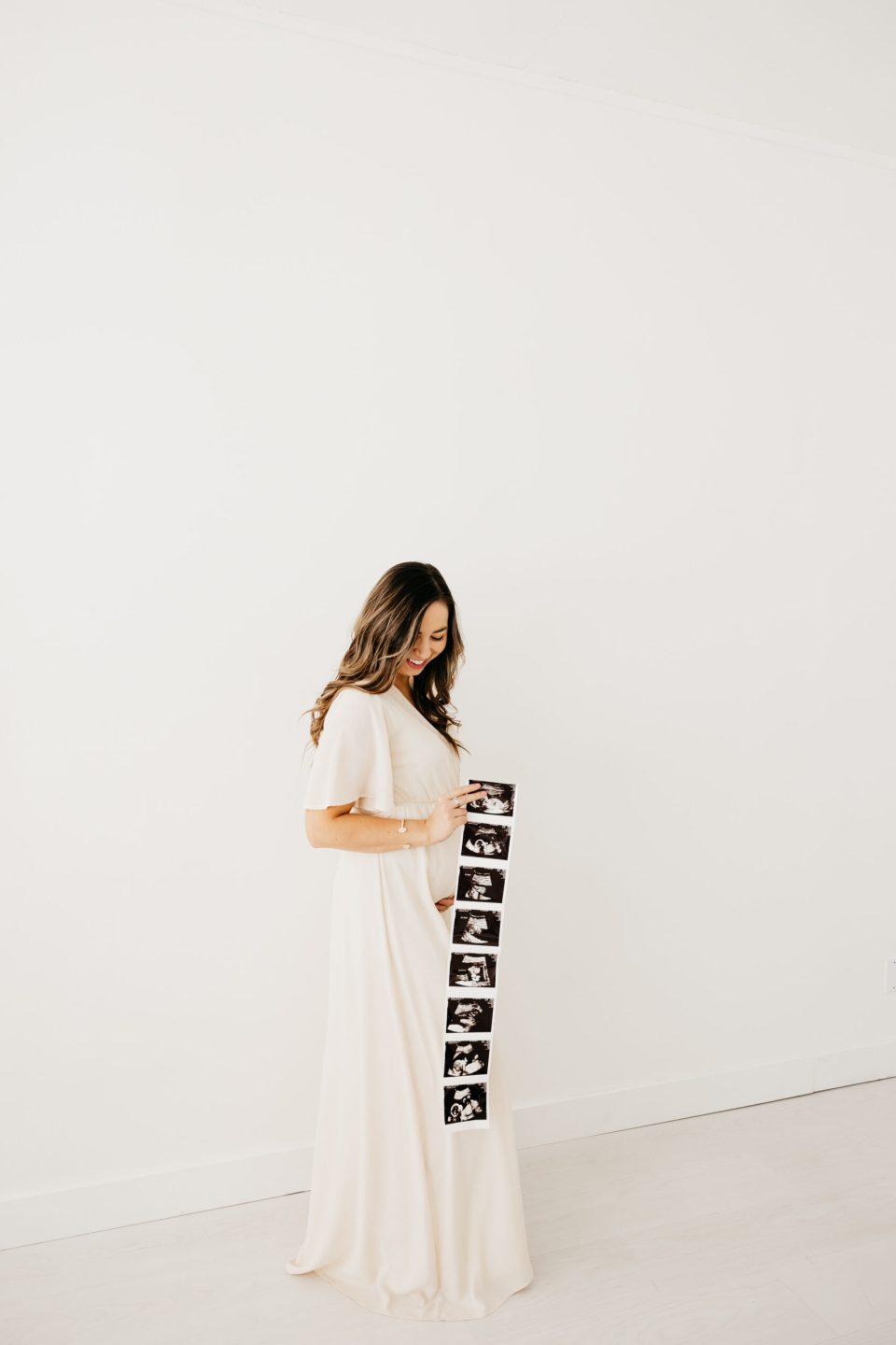 Elizabeth-McCravy-Baby-Announcement-Studio-Photos-16 pregnancy announcement for baby #3