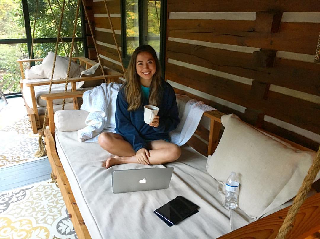 Elizabeth McCravy working on her laptop remotely