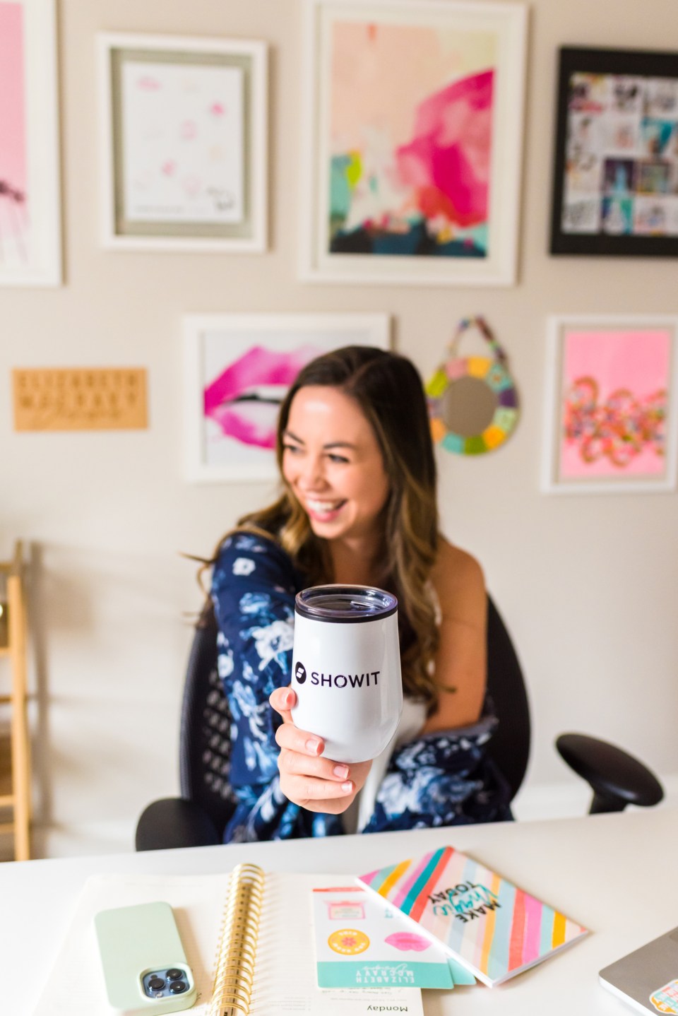 show-customer-support-tips Showit design partner holds up Showit tumbler