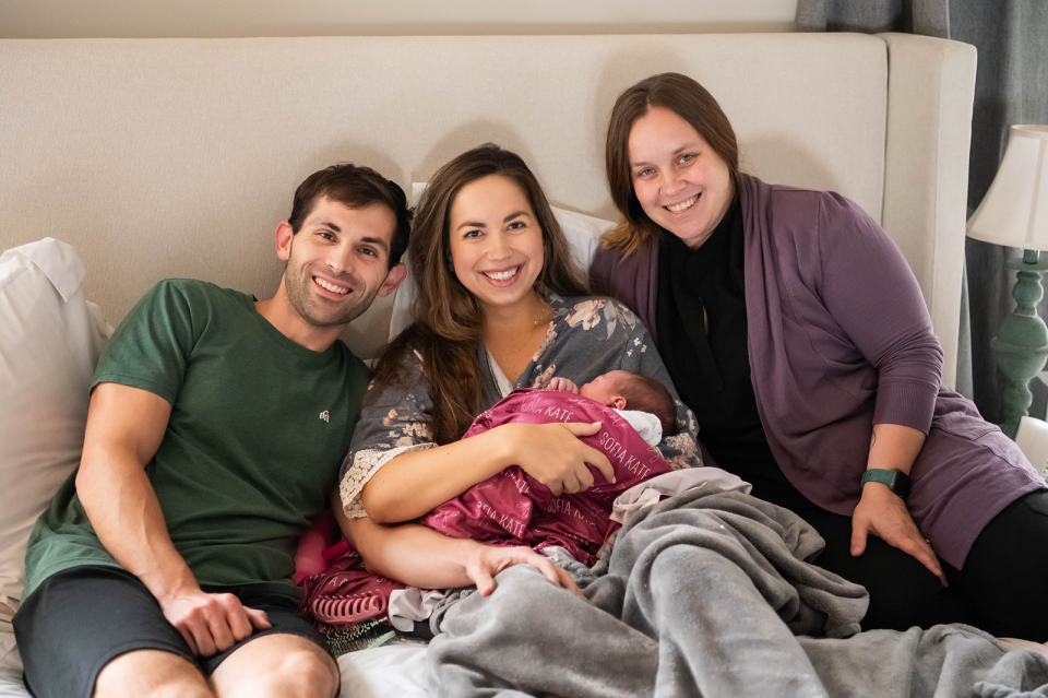 Sophia - Birth Photos mom dad and midwife after a home birth